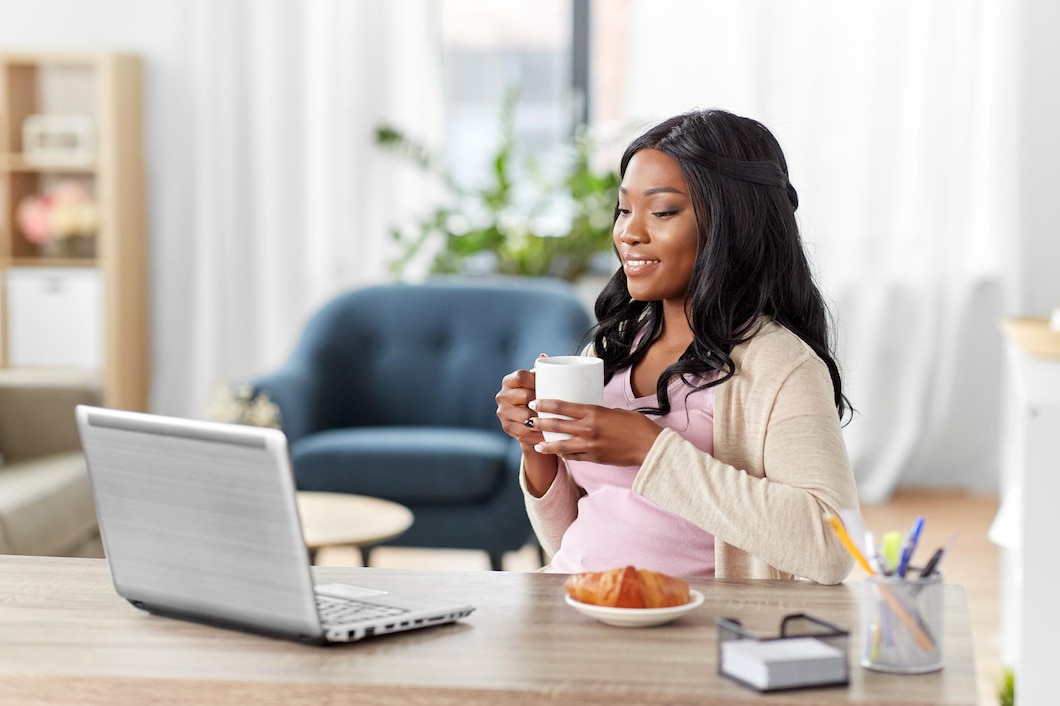 happy-woman-with-laptop-coffee-home-office_380164-256248