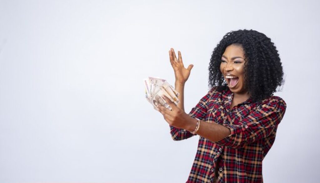 beautiful-black-woman-holding-looking-money-her-hand_181624-43772
