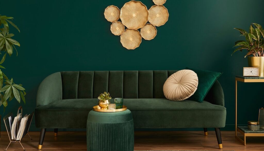 luxury-living-room-house-with-modern-interior-design-green-velvet-sofa-coffee-table-pouf-gold-decoration-plant-lamp-carpet-pillows-elegant-accessories_431307-761
