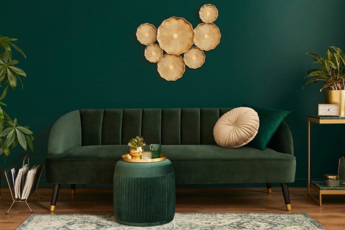 luxury-living-room-house-with-modern-interior-design-green-velvet-sofa-coffee-table-pouf-gold-decoration-plant-lamp-carpet-pillows-elegant-accessories_431307-761