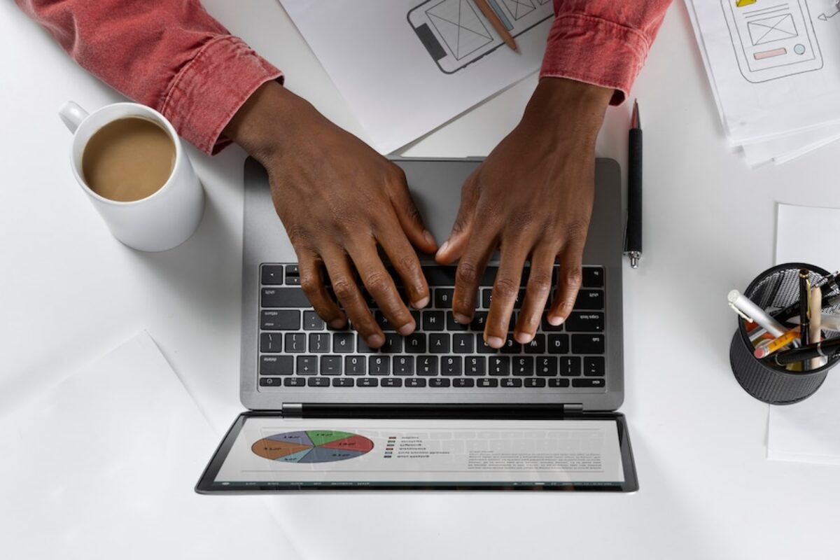 top-view-hands-typing-keyboard_23-2149762479
