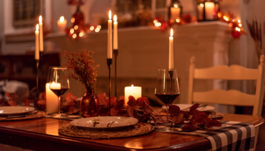 Cozy candlelight holiday dinner table